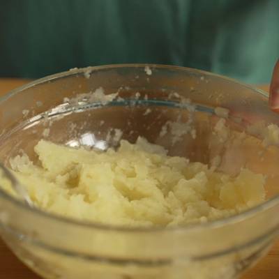 schiacciare le patate
